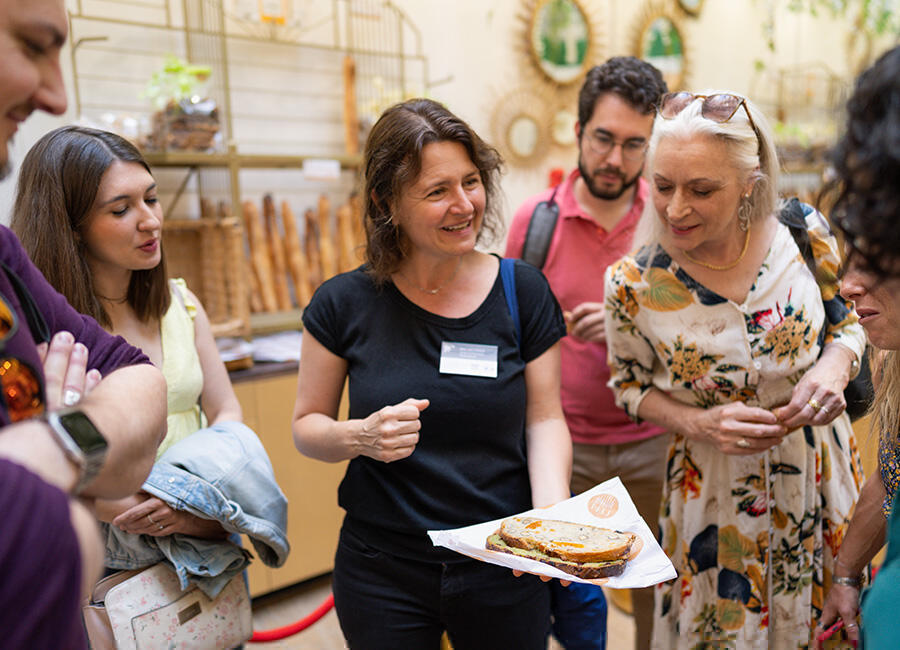 Guide showing food on Gourmet food tour in France