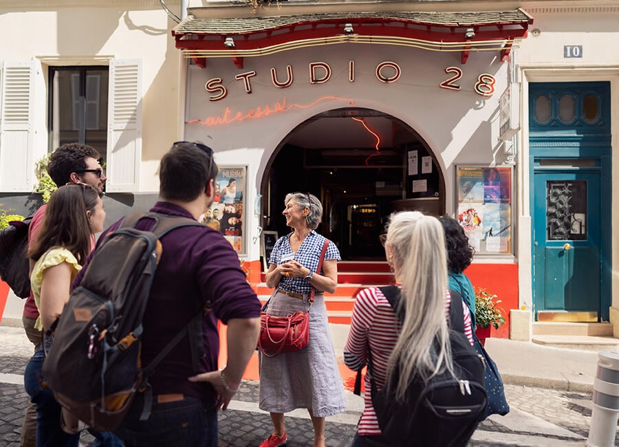 A guide speaking on the Montmartre Artists Quarter Tour