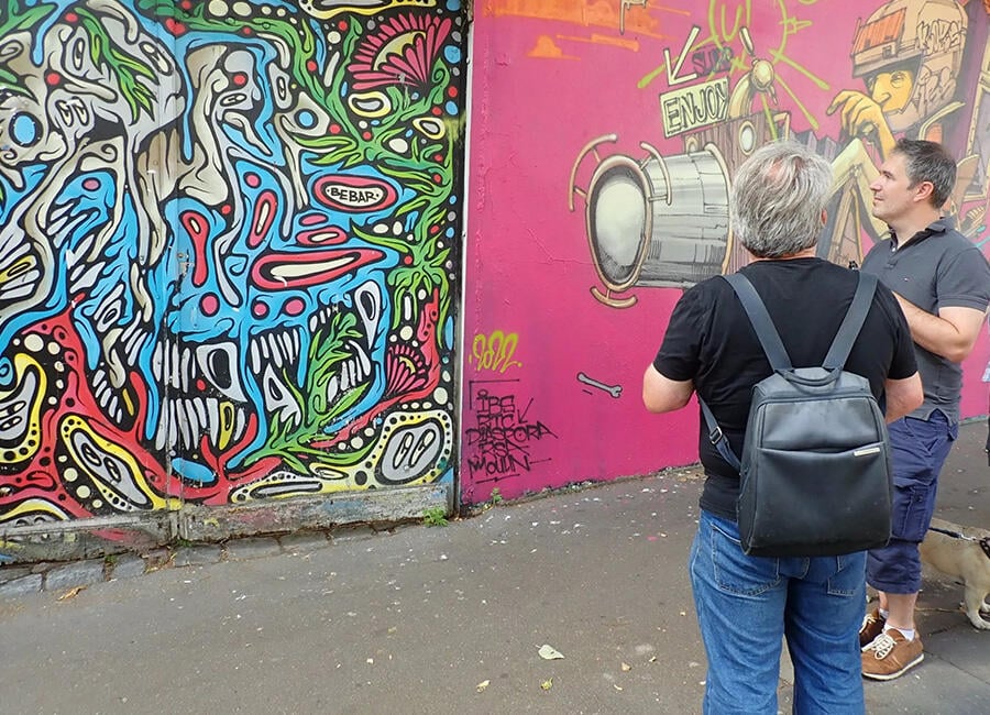 Looking at street art in Paris