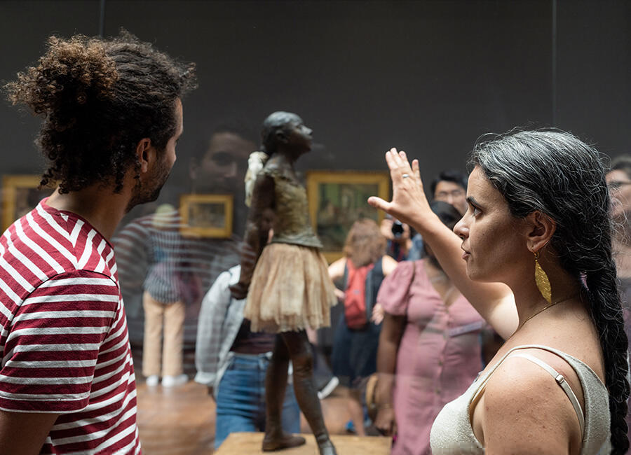 A guide talking during the Musee d'Orsay Tour